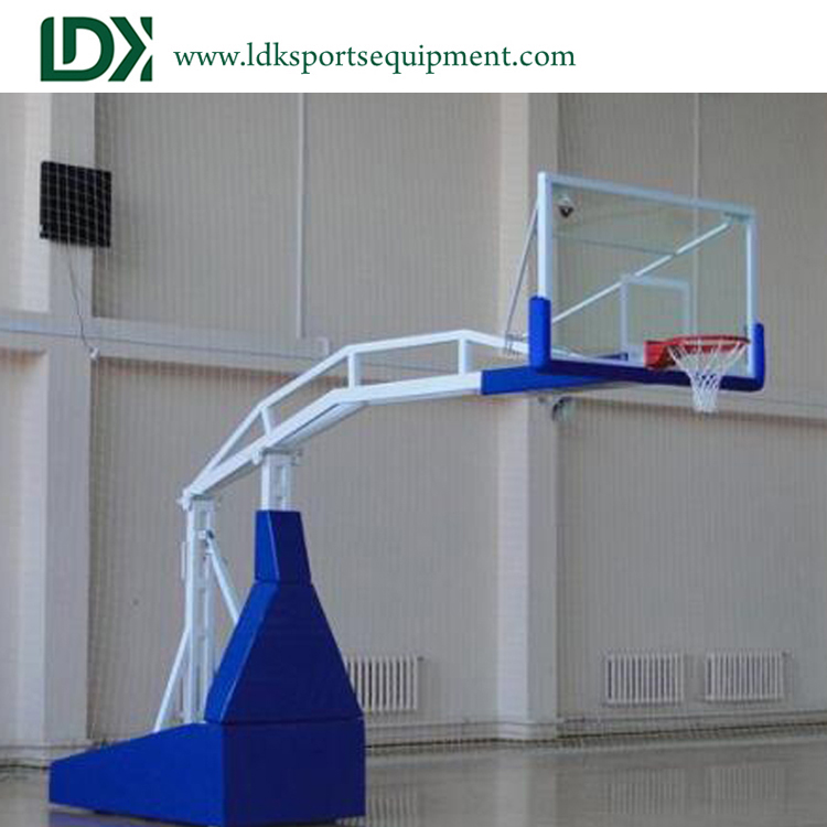 Portable spring assisted basketball hoops for competition 