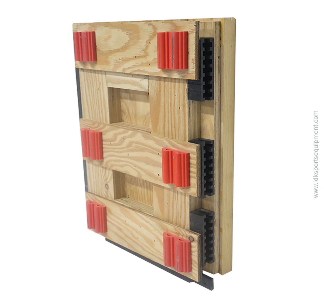 Wooden sports floor support structure shown with timber battens and resilient pads