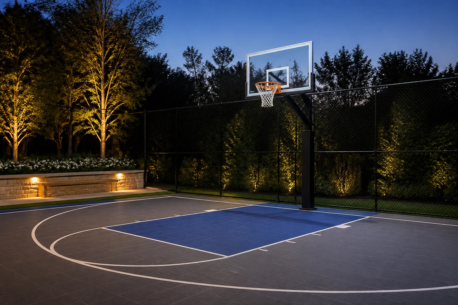 Residential basketball hoop with anchored post and perimeter fence