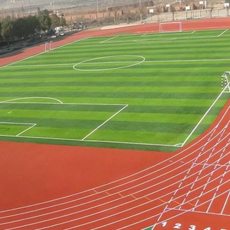 Standard 400m outdoor running track enclosing a football stadium field with 8 lane markings