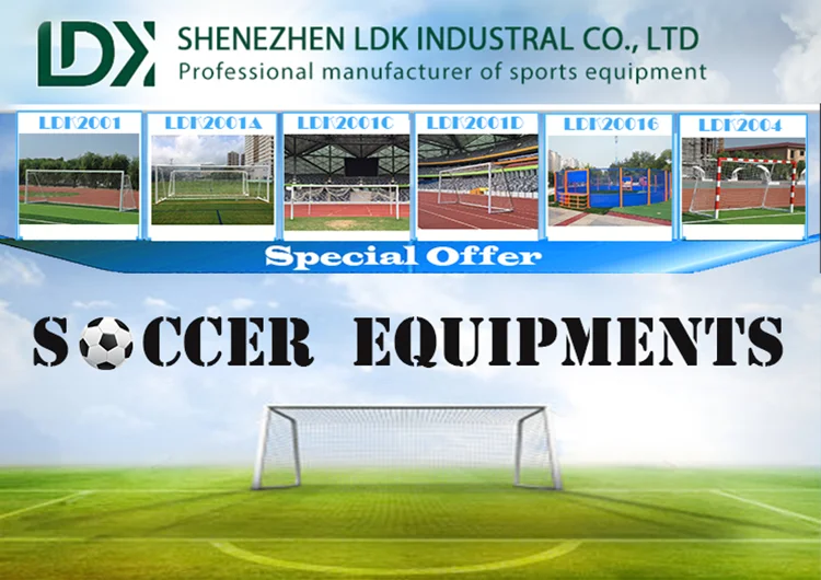 Complete outdoor artificial turf football field facility with surrounding sports fencing and goal hardware