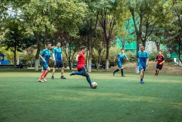 Players in a compact football training scene
