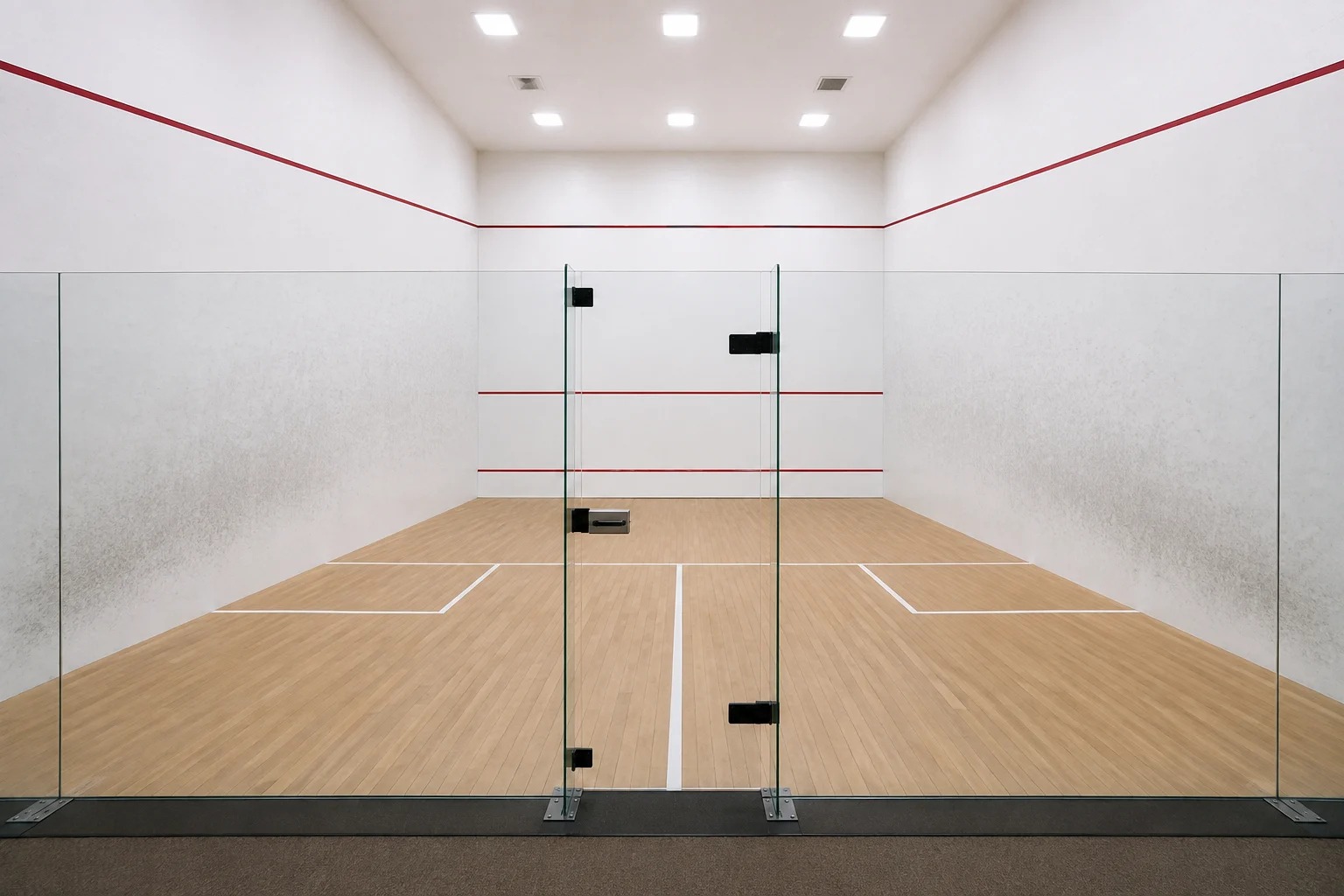 Regulation-style squash court with glass back wall and court lines