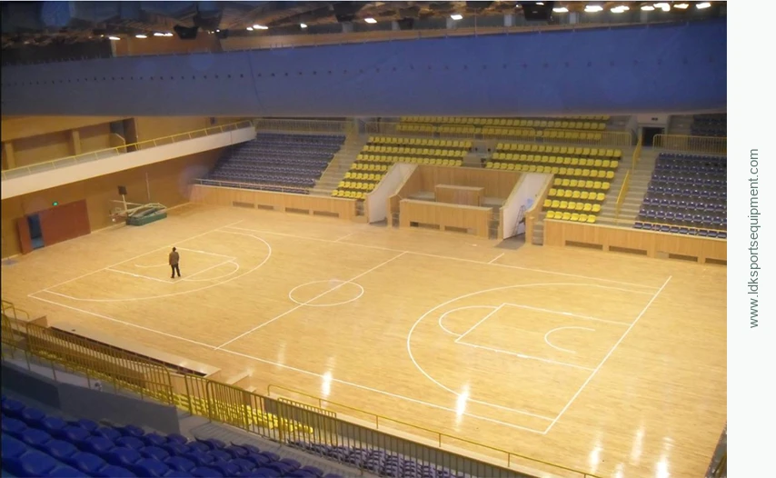 Indoor basketball court with a wooden playing surface