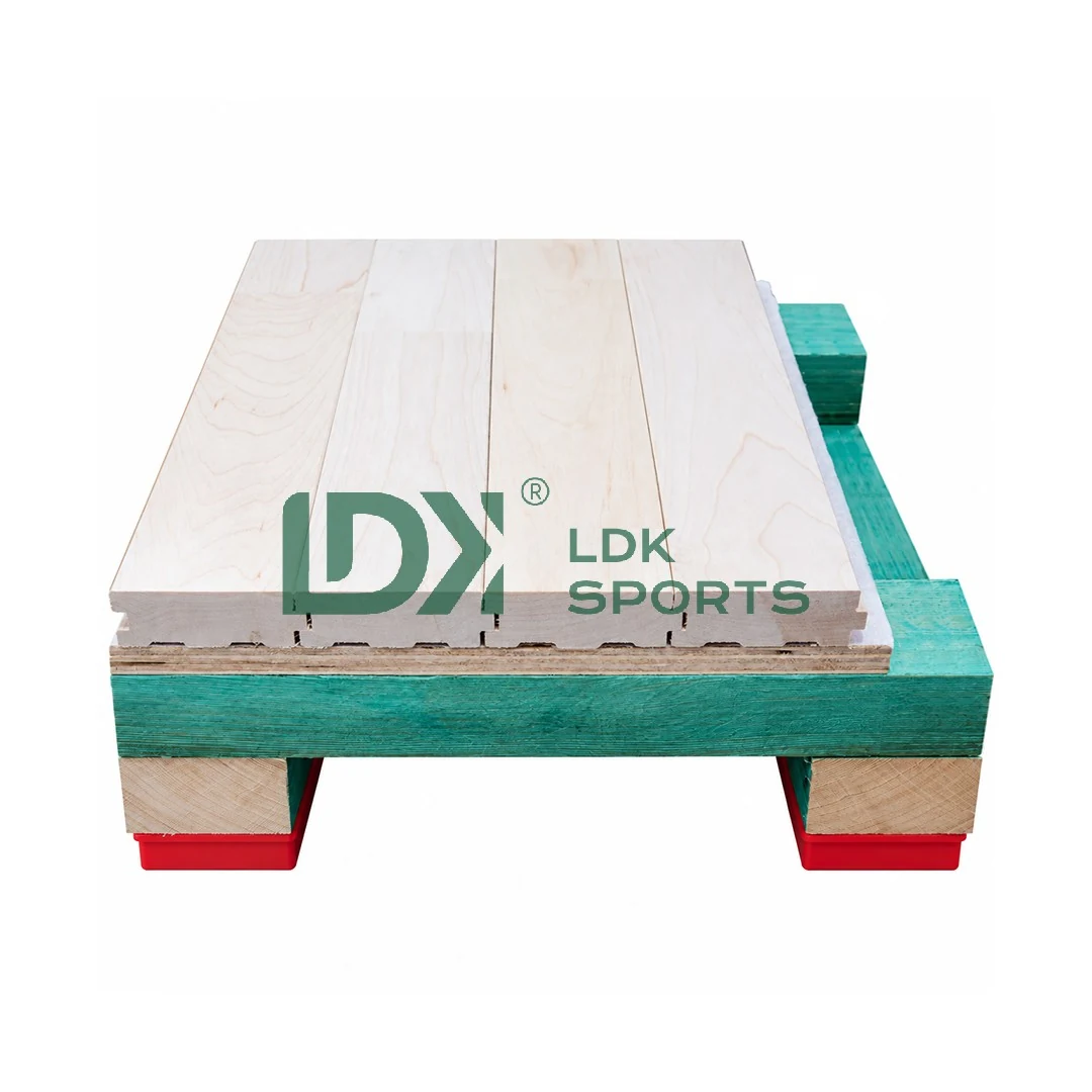 Construction section of an LDK double-joist sports wood floor showing surface, joists and resilient pads